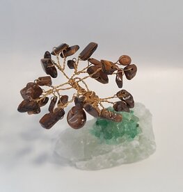 Boom van natuursteen met Tijgeroog blaadjes