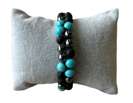 Gevlochten dames armband met Turquoise
