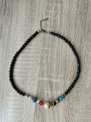 Damesketting van natuursteen Blauwvloed met het zonnestelsel