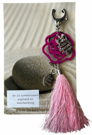 Uil met roze rok