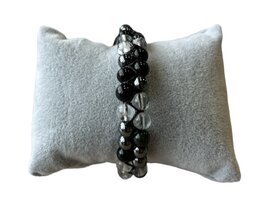 Dames gevlochten armband met Bergkristal, Hematiet en Obsidiaan Dames gevlochten armband met Bergkristal, Hematiet en Obsidiaan