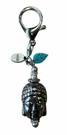 Sleutelhanger Boeddha hoofd (zilver kleur) met accessoires